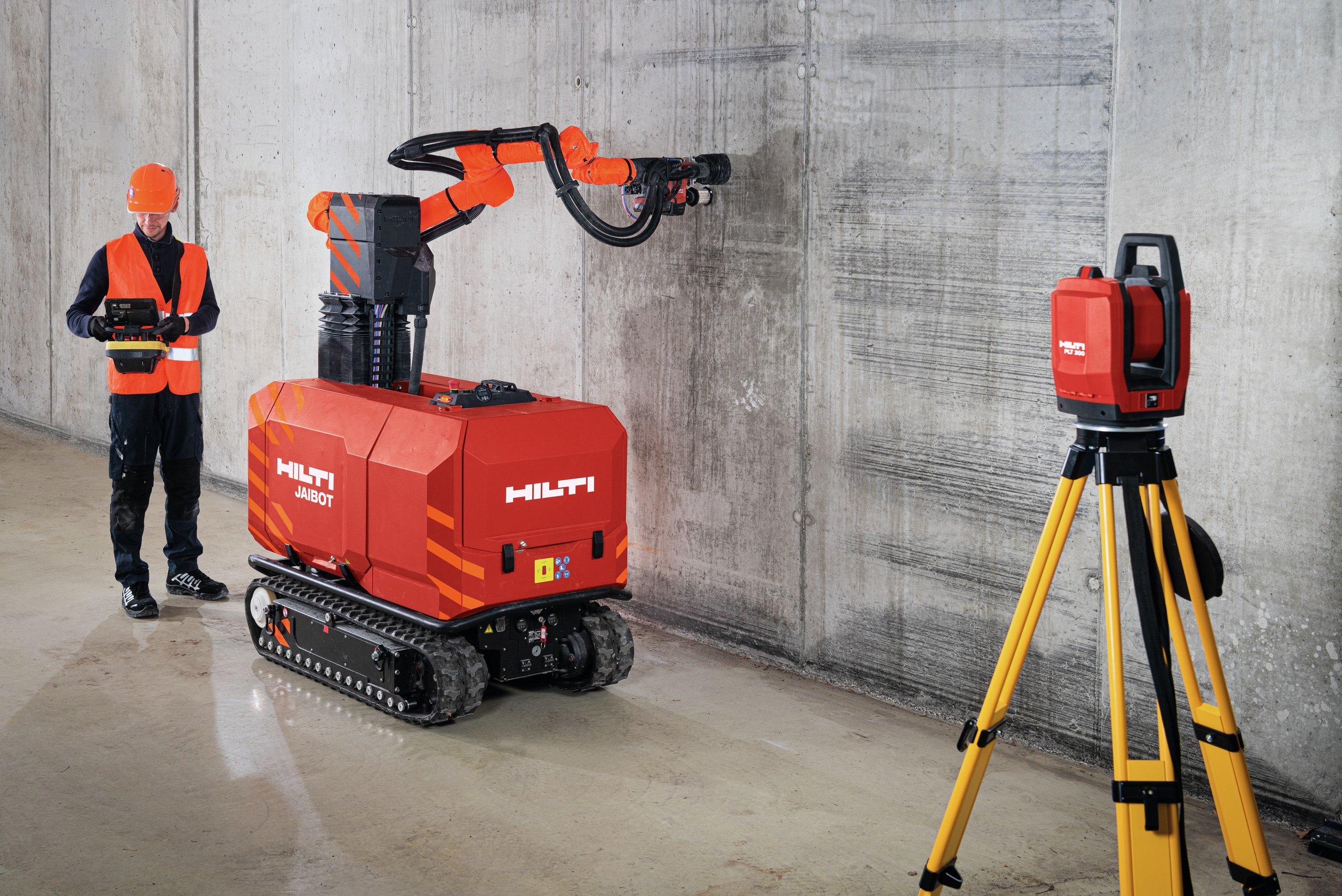 Hilti PLT 300 -robottitakymetri ja Jaibot-porausrobotti rakennustyömaalla tekemässä LVIS-asennuksia.