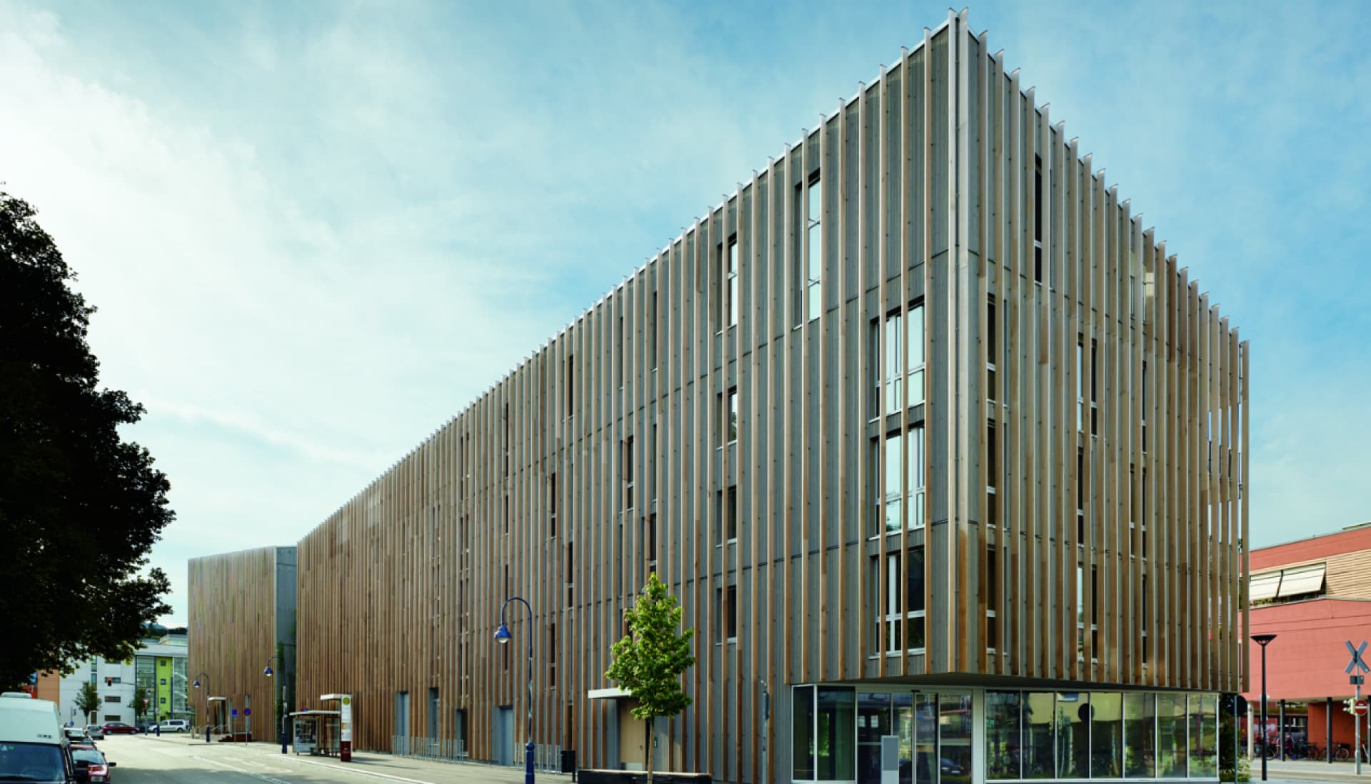 Image of a mixed use building with a wood facade