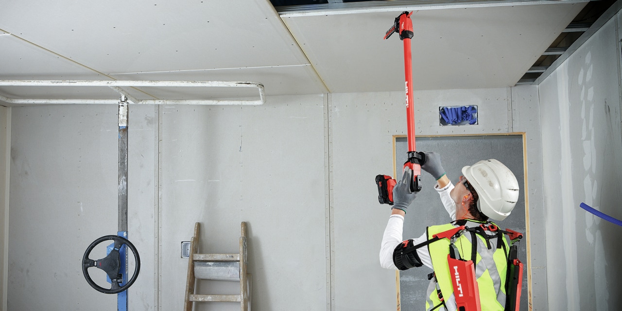 msan using Hilti's extension pole for a ceiling application
