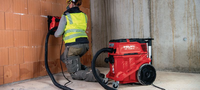 VC 40M-X M-Class dust extractor Powerful dust extractor with large container and push-bar for connection with power tools and jobsite clean ups (wet & dry), 30l tank Applications 1